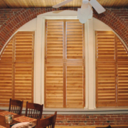 Arched Windows can be covered with custom shutters from Marco Shutters.