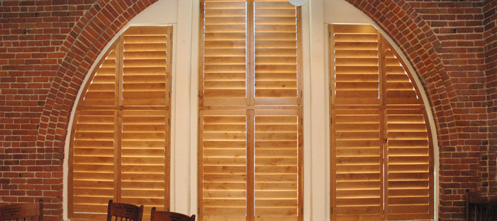 Arched Windows can be covered with custom shutters from Marco Shutters.